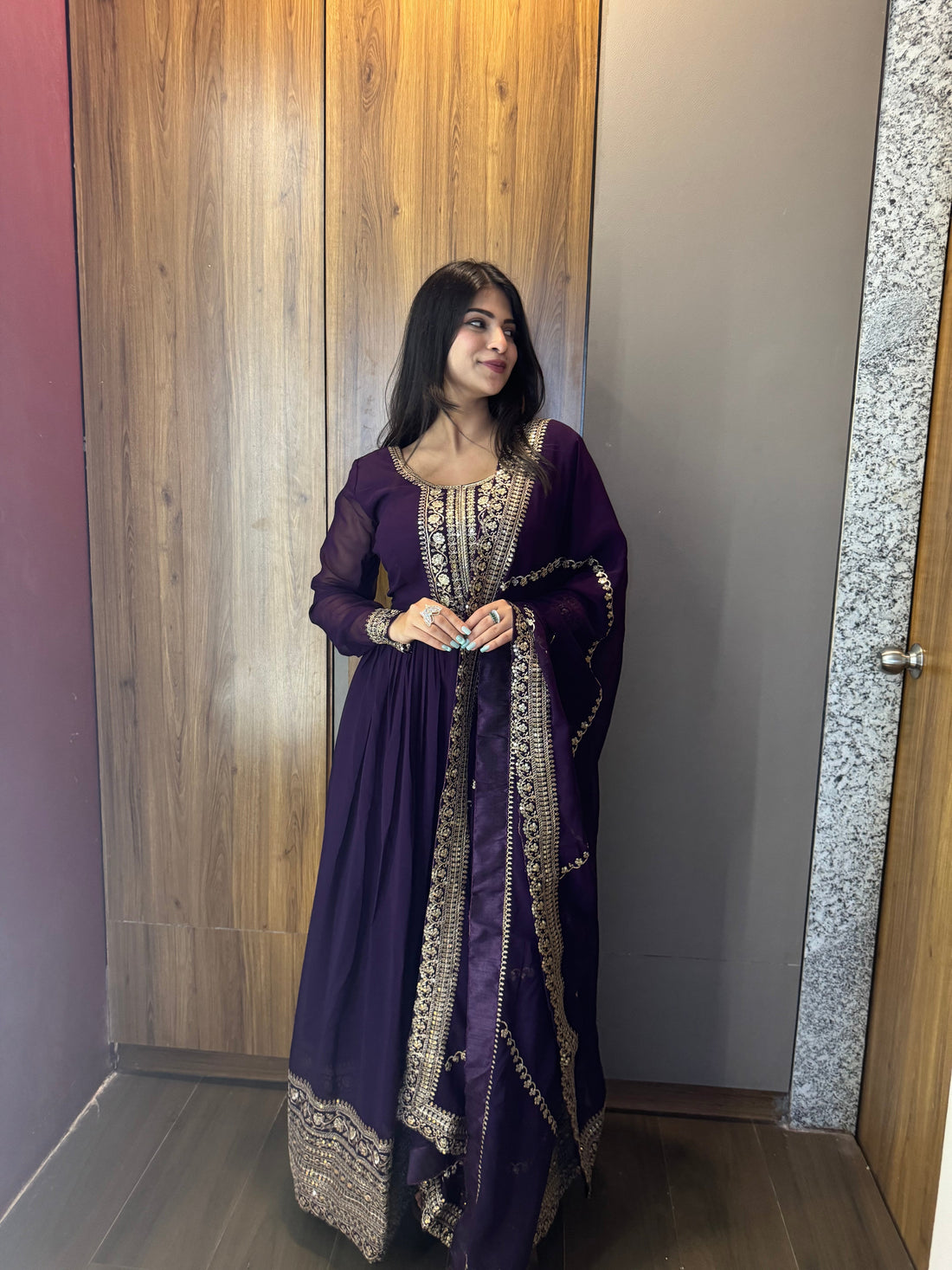 ANCHOR VISHWA PANDYA IN PURPLE COLOR FAUX BLOOMING RICH SEQUENCE EMBROIDERED GOWN