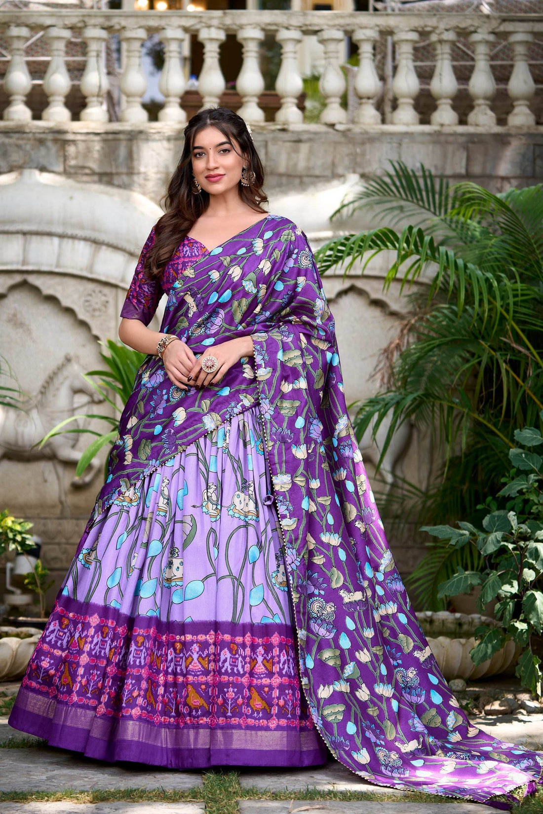 LAVENDER PICHWAI & PATOLA PRINT TUSSAR SILK LEHENGA CHOLI WITH ZARI WEAVING BORDER