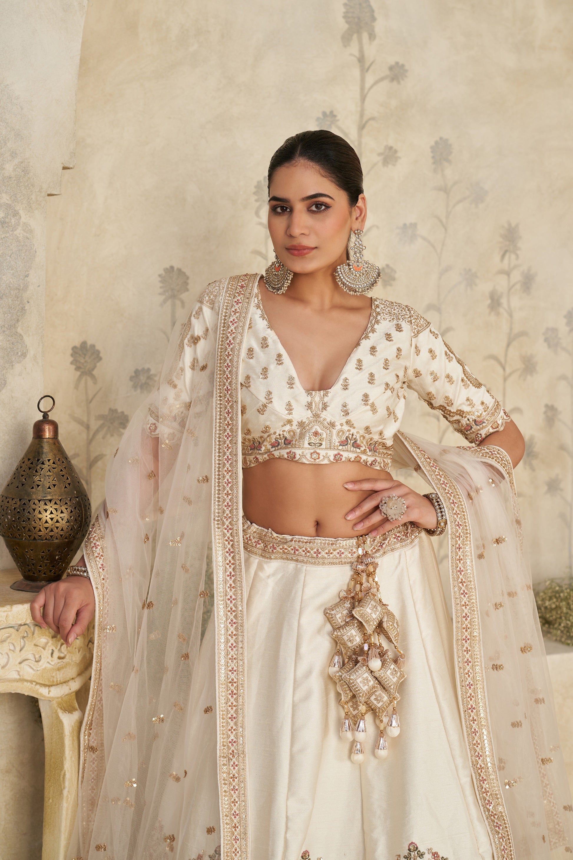 WHITE LEHENGA WITH INTRICATE ELEPHANT ZARI WORK – ROYAL FESTIVE WEAR