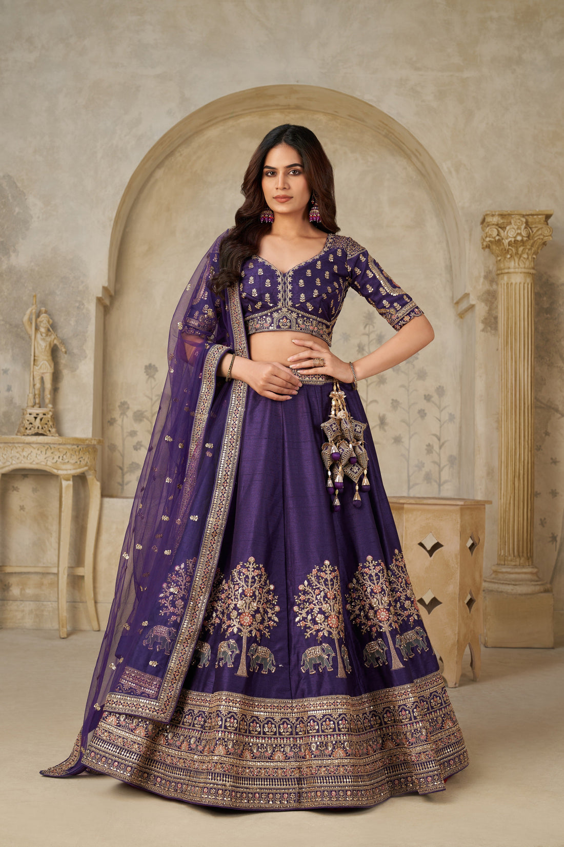 ROYAL PURPLE WEDDING LEHENGA WITH INTRICATE ELEPHANT MOTIFS