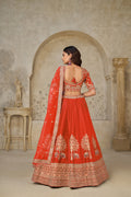 TRENDY RUST WEDDING LEHENGA WITH INTRICATE ELEPHANT MOTIFS