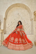 TRENDY RUST WEDDING LEHENGA WITH INTRICATE ELEPHANT MOTIFS