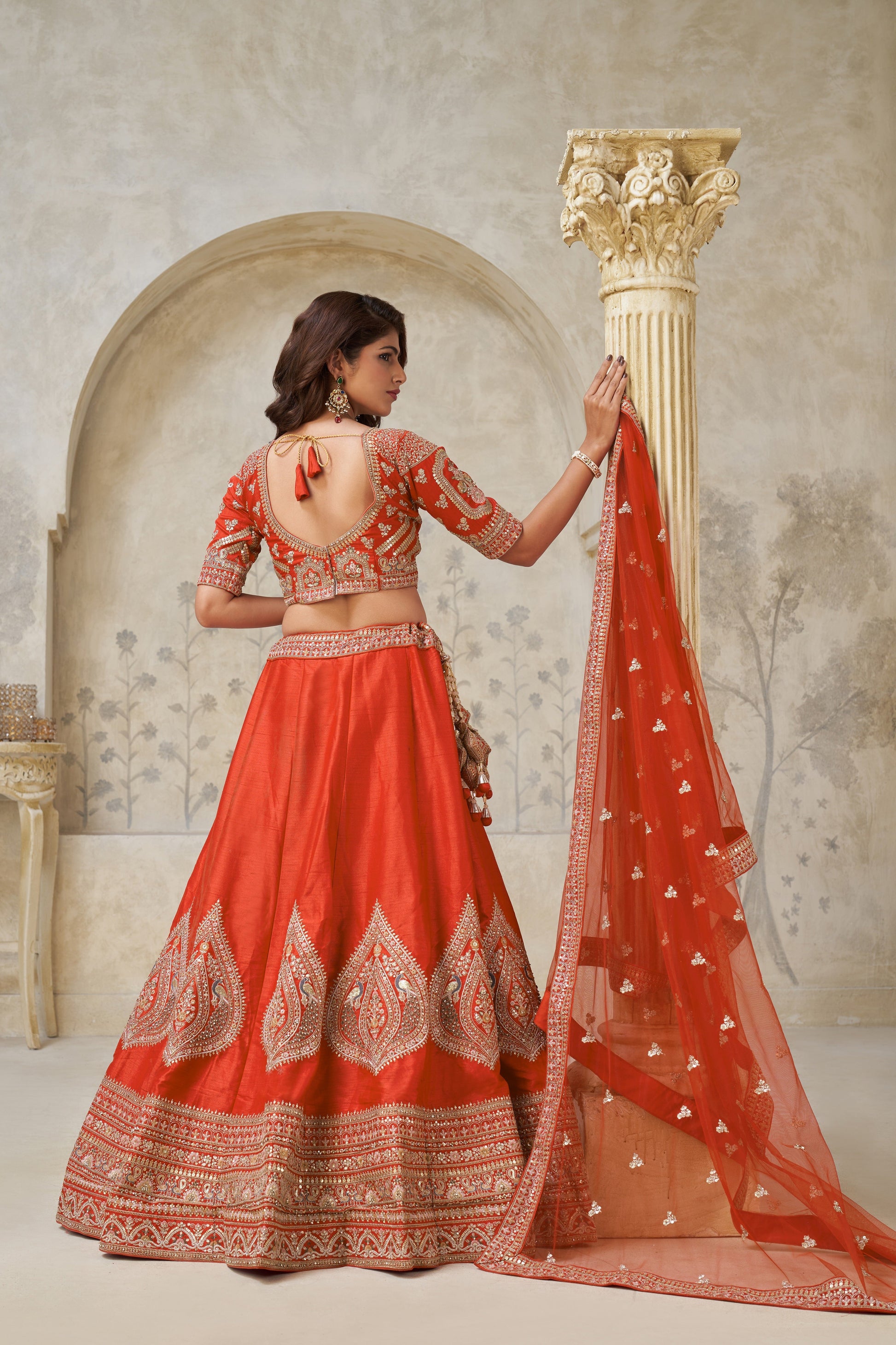PREMIUM RUST LEHENGA WITH ELEGANT LEAF MOTIF WORK