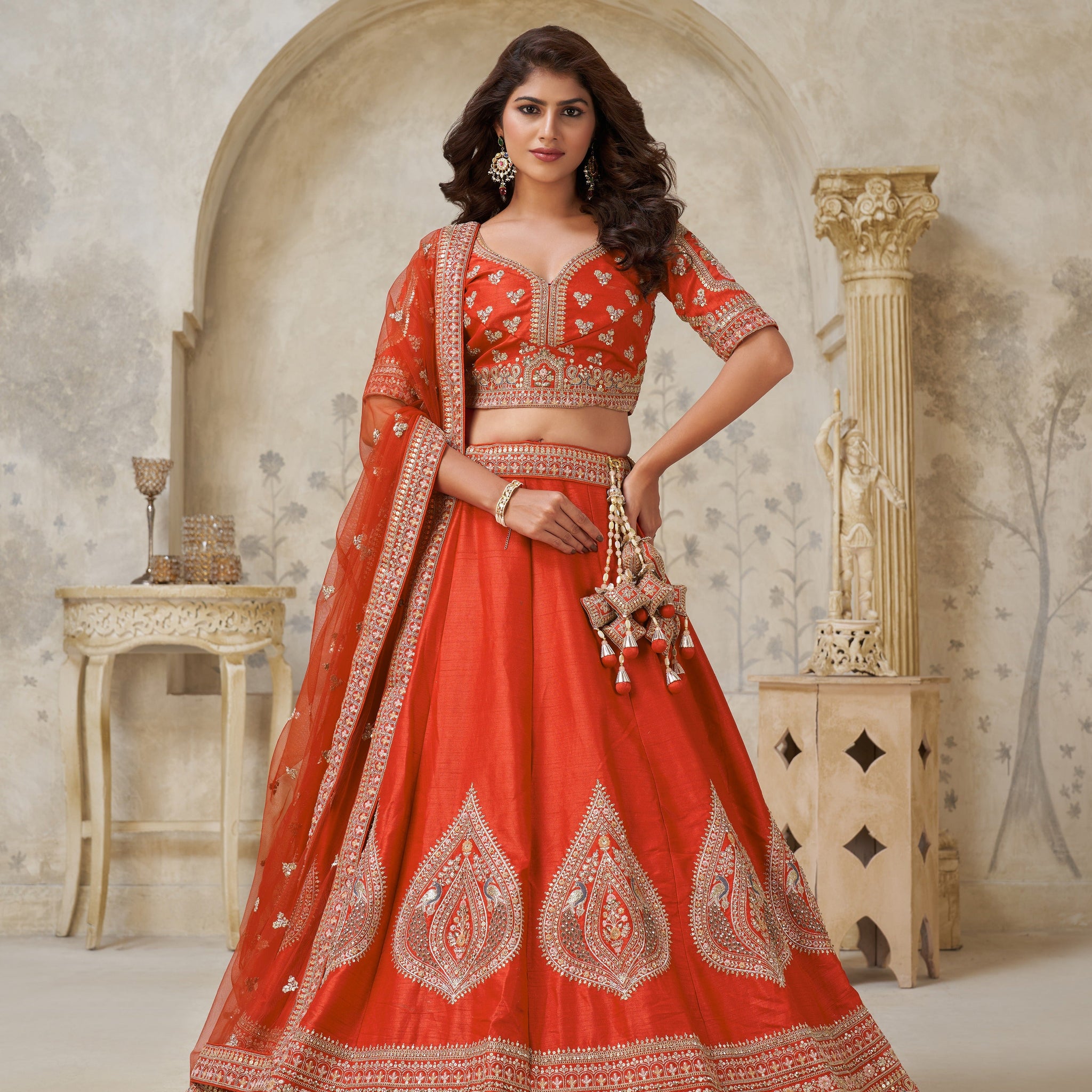 PREMIUM RUST LEHENGA WITH ELEGANT LEAF MOTIF WORK