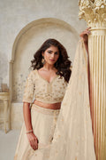 ELEGANT BEIGE IVORY WEDDING LEHENGA WITH INTRICATE LEAF EMBROIDERY