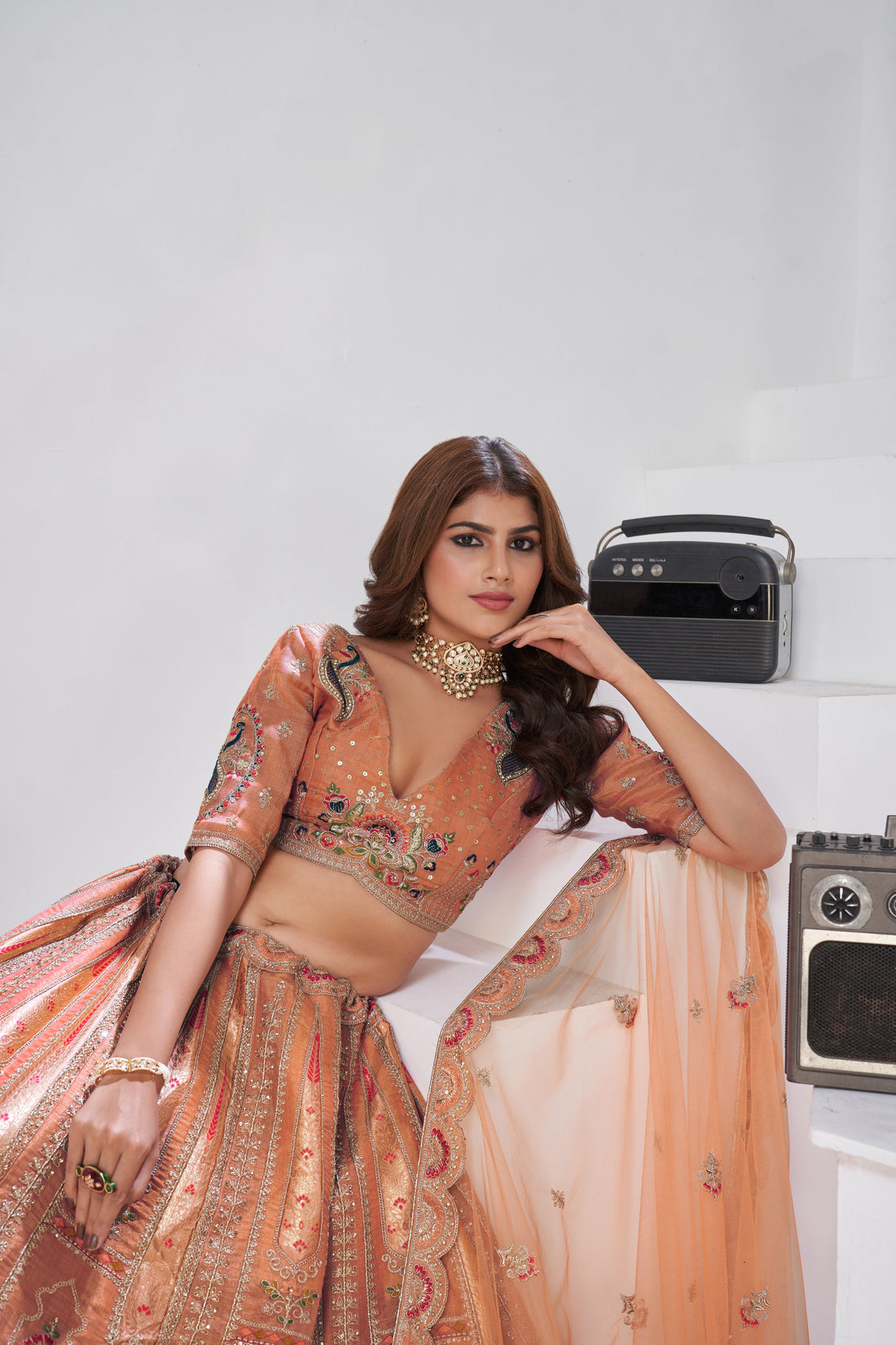 GRACE IN RUST – ELEGANT LEHENGA WITH GOLDEN DETAILING