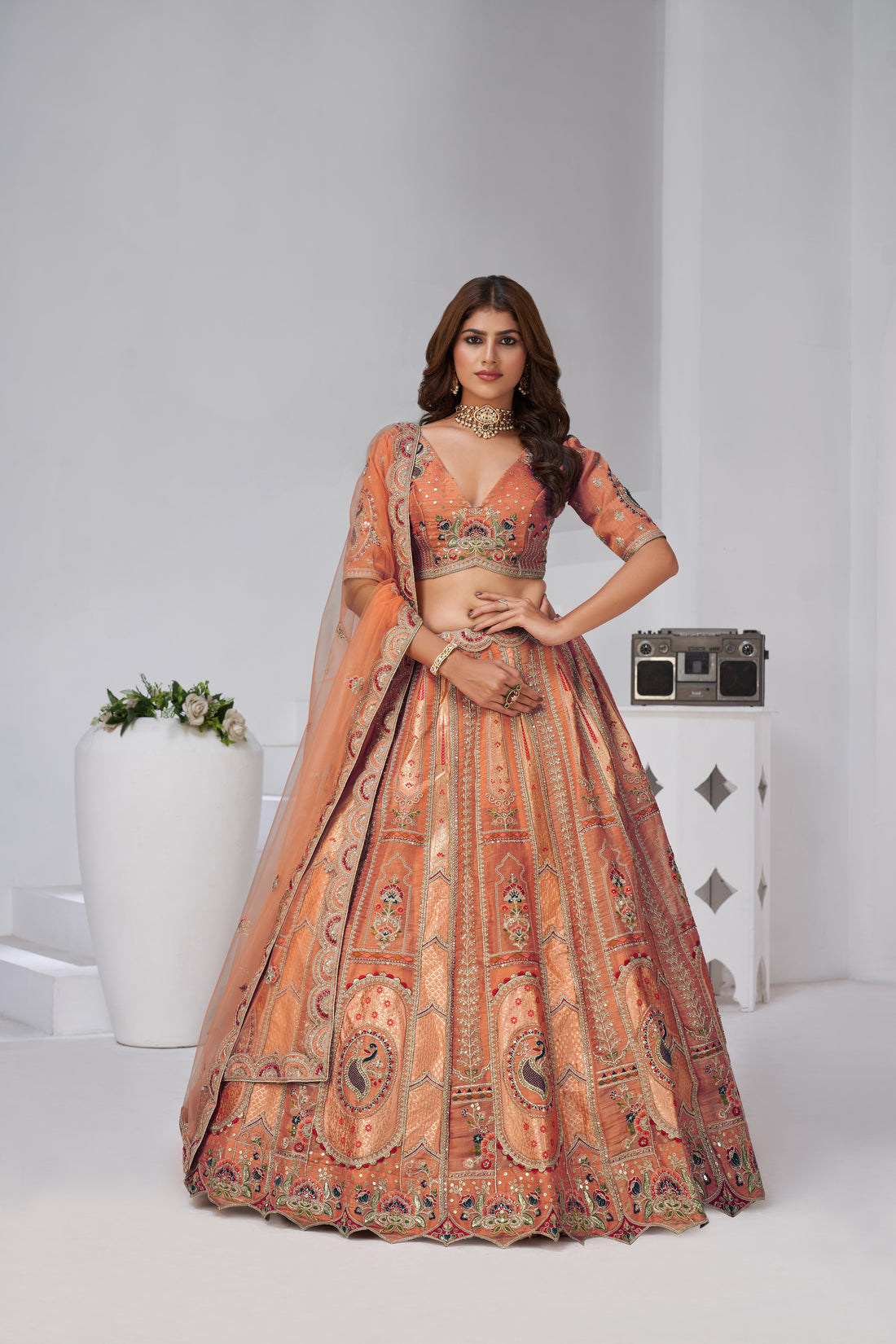 GRACE IN RUST – ELEGANT LEHENGA WITH GOLDEN DETAILING