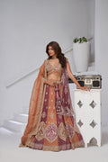 TWO SHADES OF ELEGANCE – RUST & DARK RUST LEHENGA WITH DOUBLE DUPATTAS