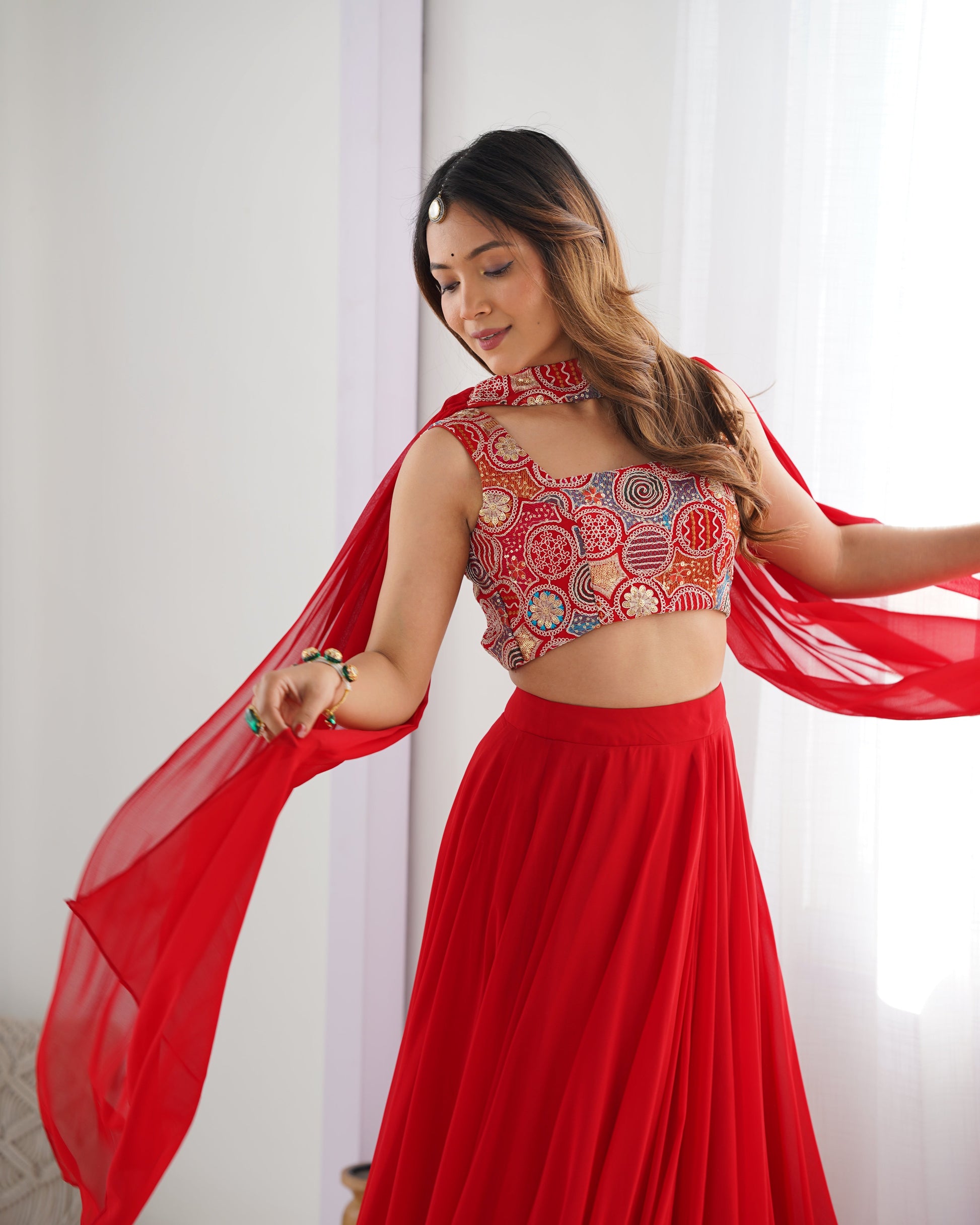 RED COLOR FULLY FLARED LEHENGA CHOLI WITH EXQUISITE EMBROIDERY