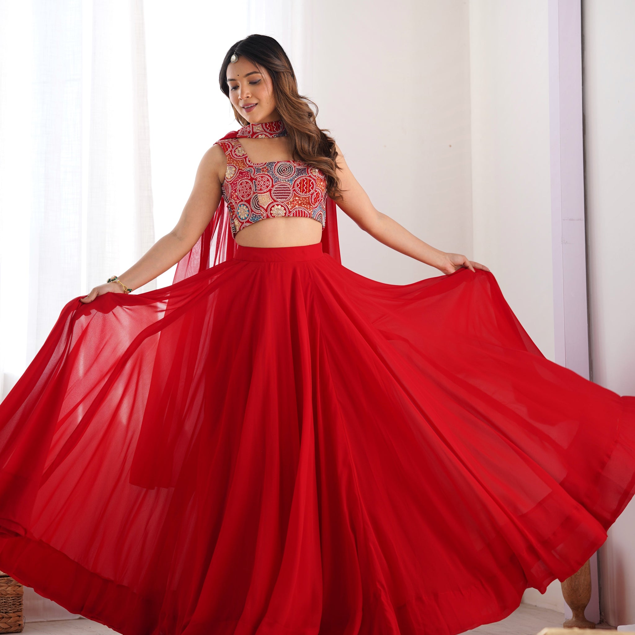 RED COLOR FULLY FLARED LEHENGA CHOLI WITH EXQUISITE EMBROIDERY