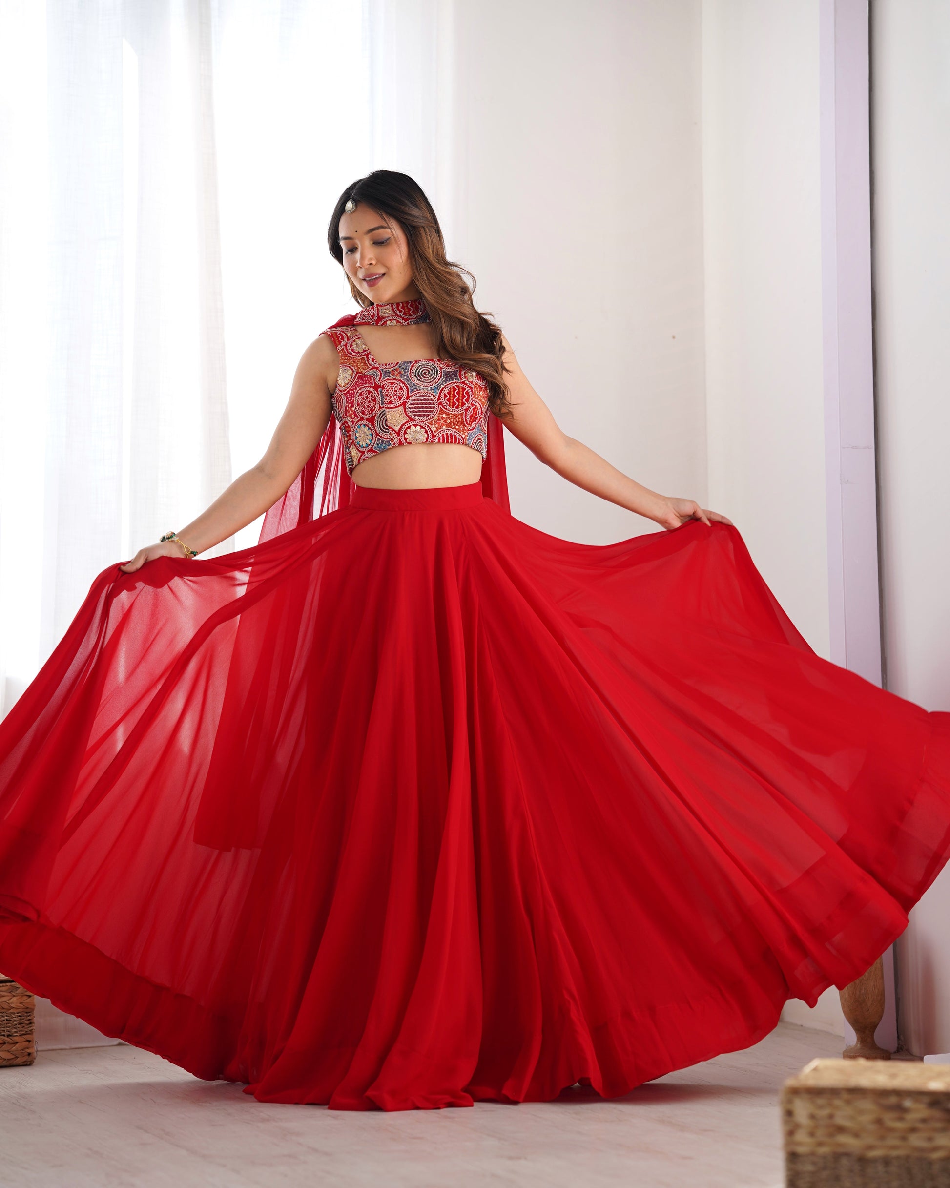 RED COLOR FULLY FLARED LEHENGA CHOLI WITH EXQUISITE EMBROIDERY