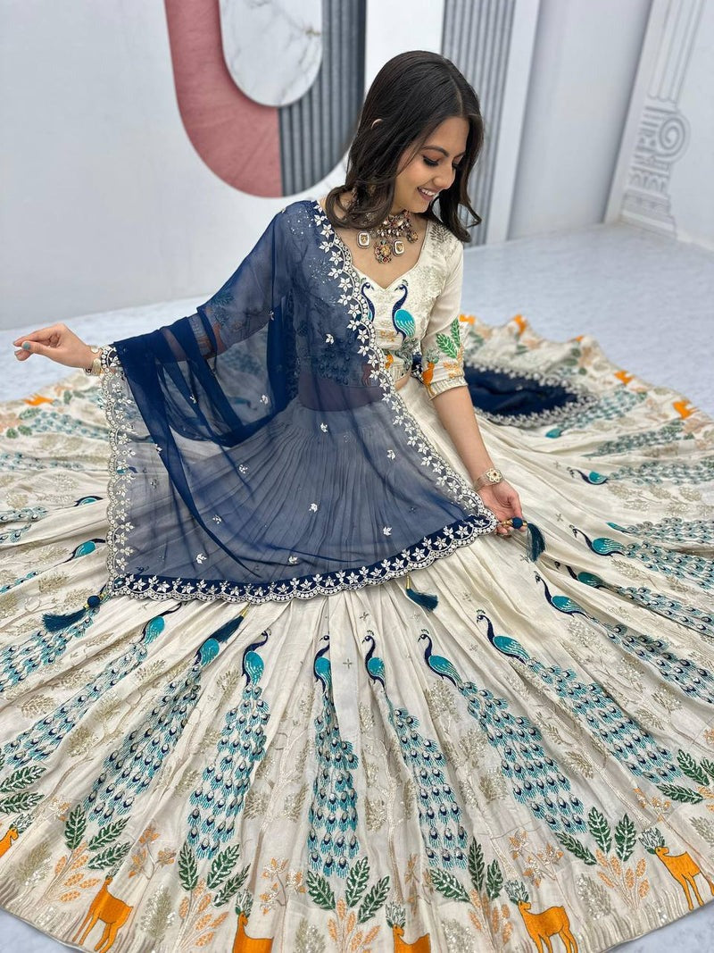 OFF WHITE PEACOCK DESIGN TISSUE SILK BASE EMBROIDERED WORK LEHENGA FOR WEDDING