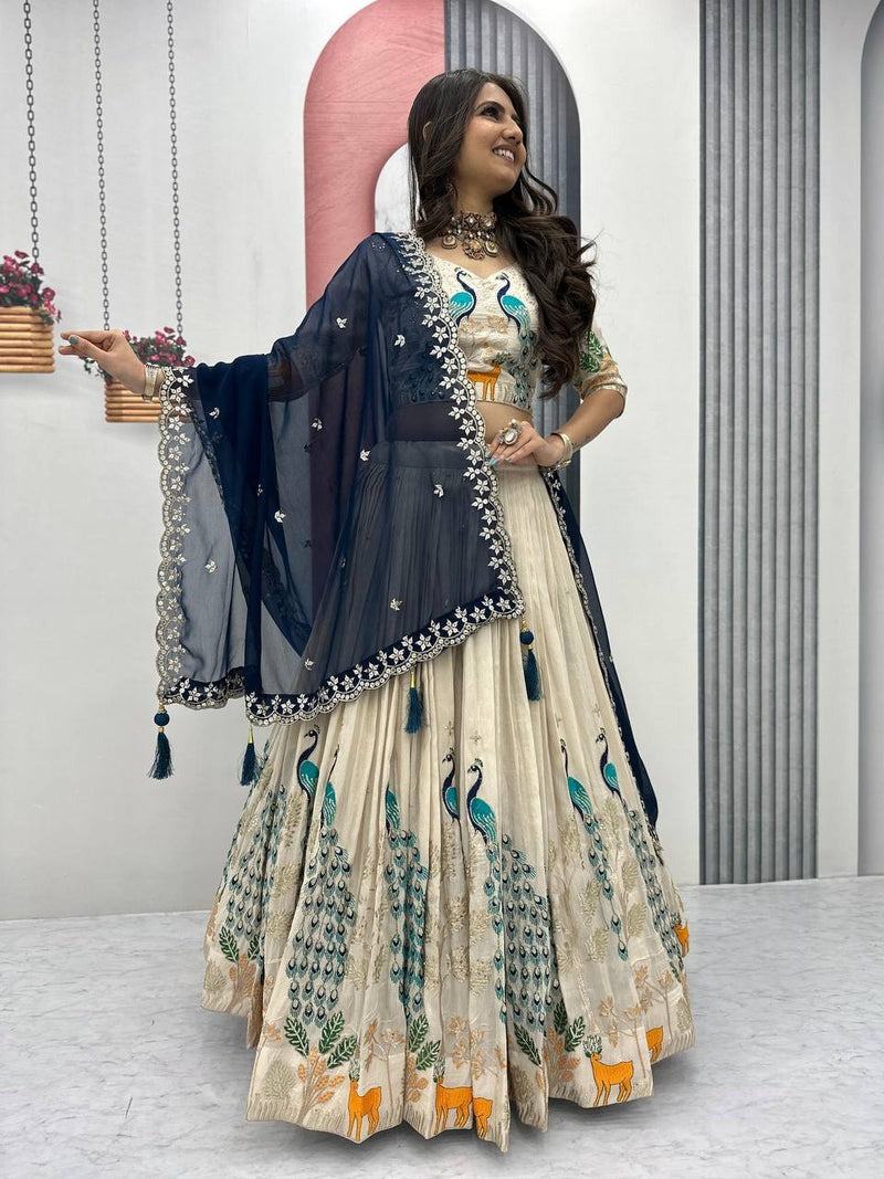 OFF WHITE PEACOCK DESIGN TISSUE SILK BASE EMBROIDERED WORK LEHENGA FOR WEDDING