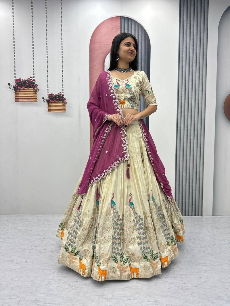 OFF WHITE PEACOCK DESIGN TISSUE SILK BASE EMBROIDERED WORK LEHENGA FOR WEDDING