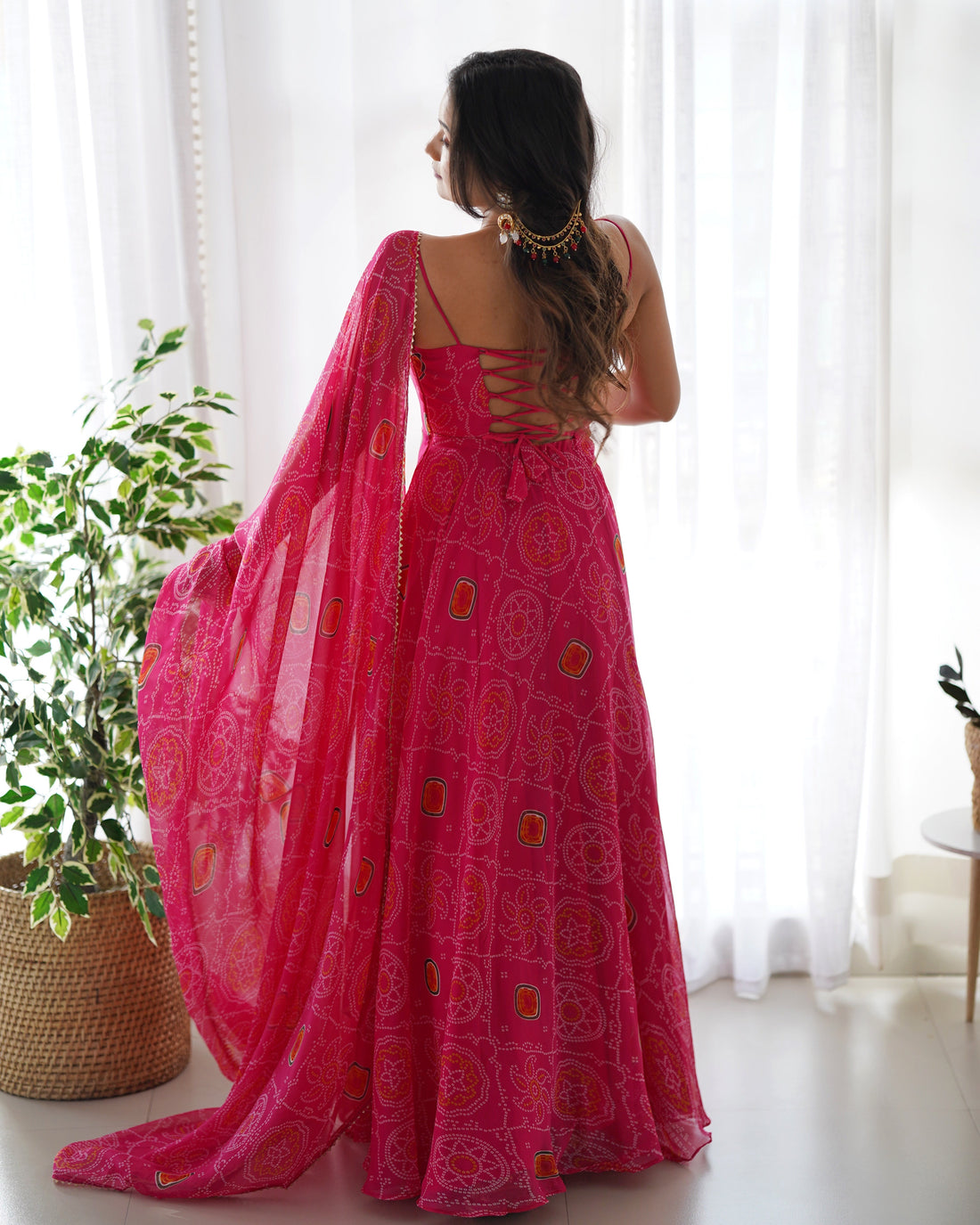 FLAUNT YOUR STYLE WITH OUR READY-TO-WEAR PINK BANDHEJ PRINT CHIFFON GOWN