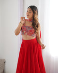 RED COLOR FULLY FLARED LEHENGA CHOLI WITH EXQUISITE EMBROIDERY