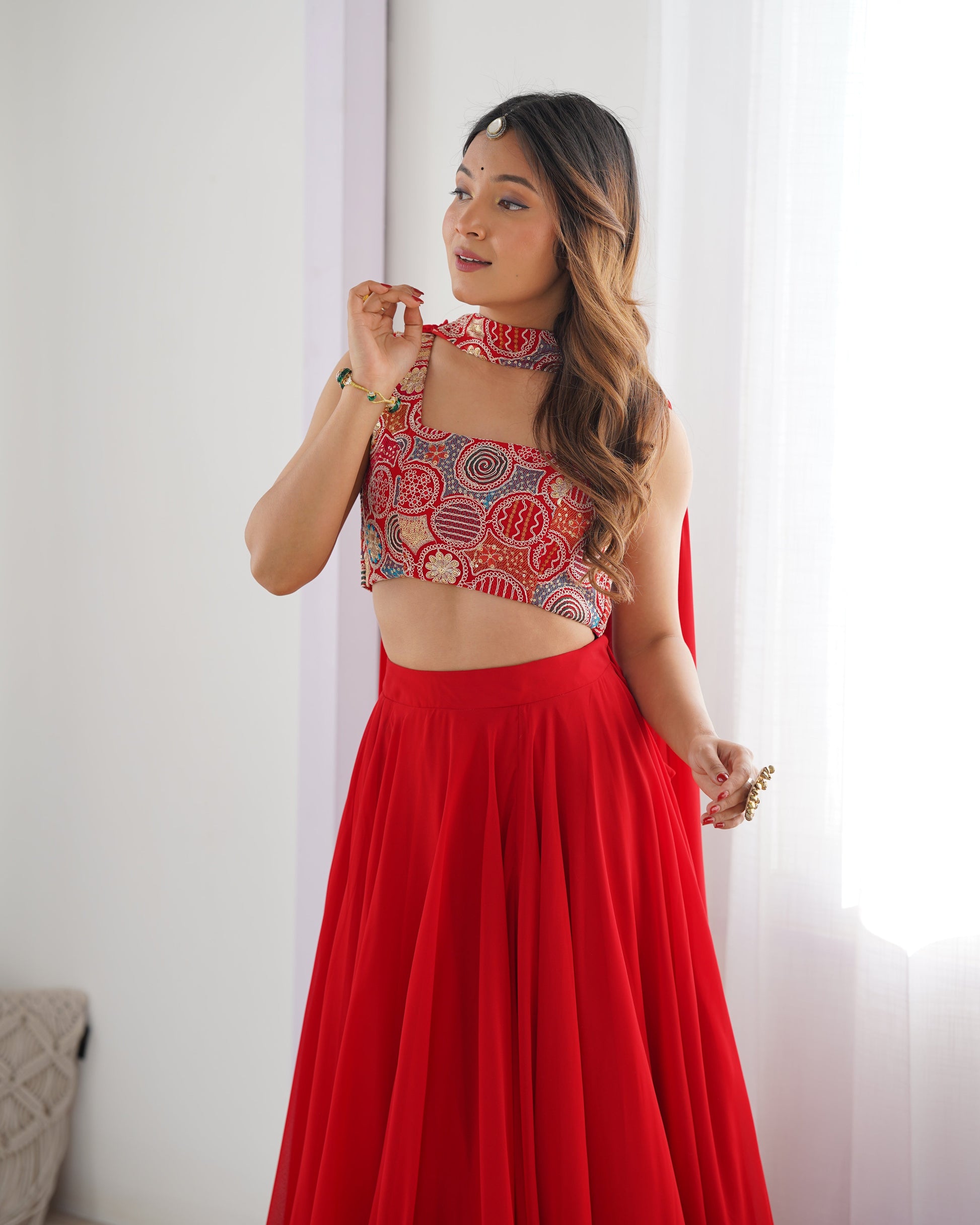 RED COLOR FULLY FLARED LEHENGA CHOLI WITH EXQUISITE EMBROIDERY