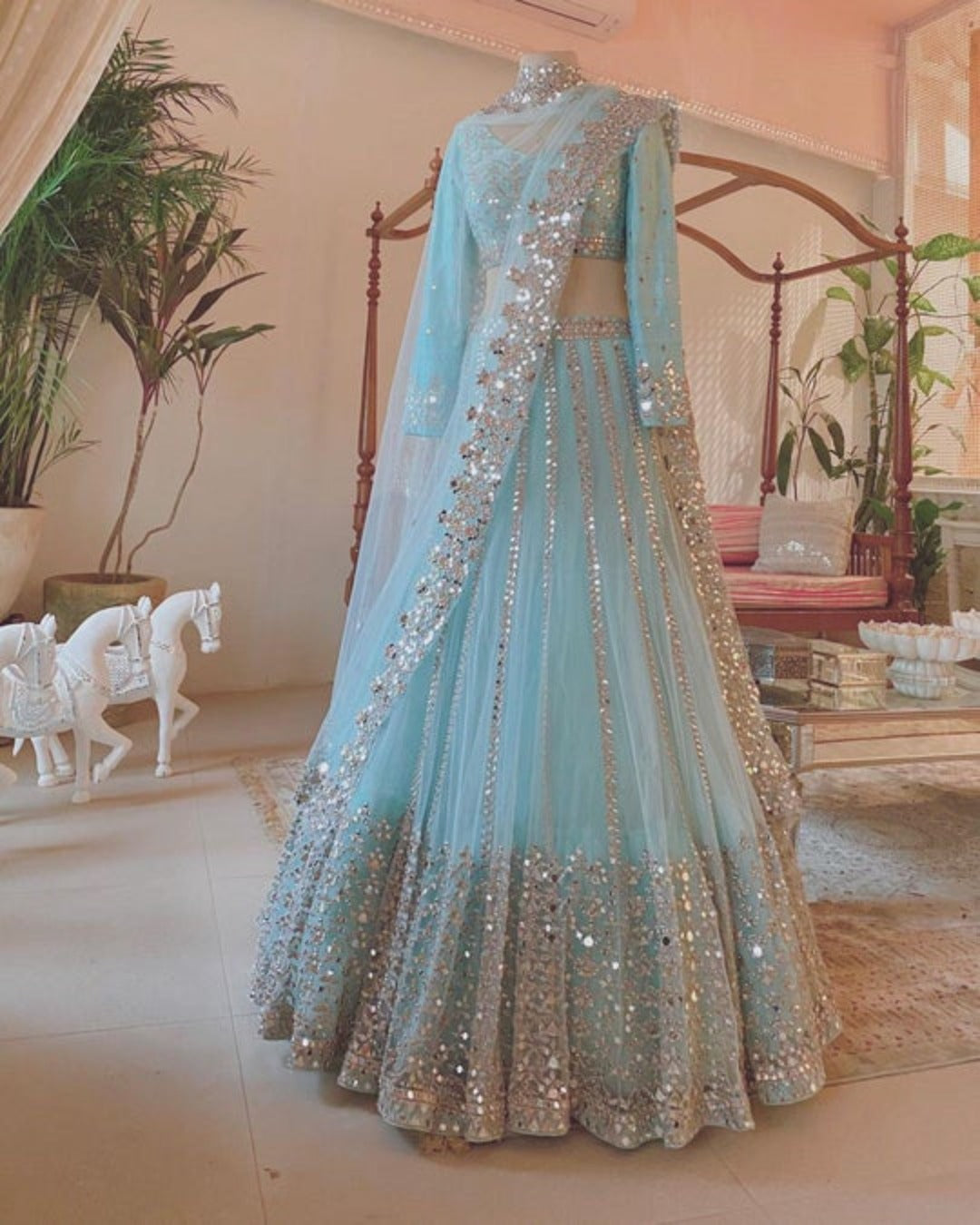 EXQUISITE SKY BLUE COLOR SOFT NET BASE  FLARED LEHENGA CHOLI