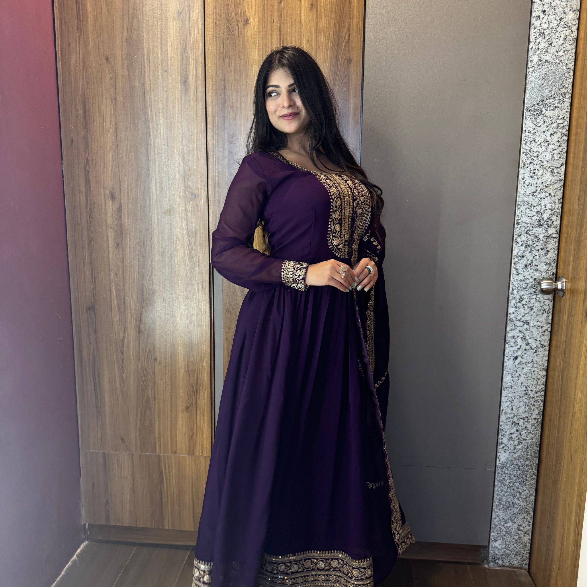 ANCHOR VISHWA PANDYA IN PURPLE COLOR FAUX BLOOMING RICH SEQUENCE EMBROIDERED GOWN