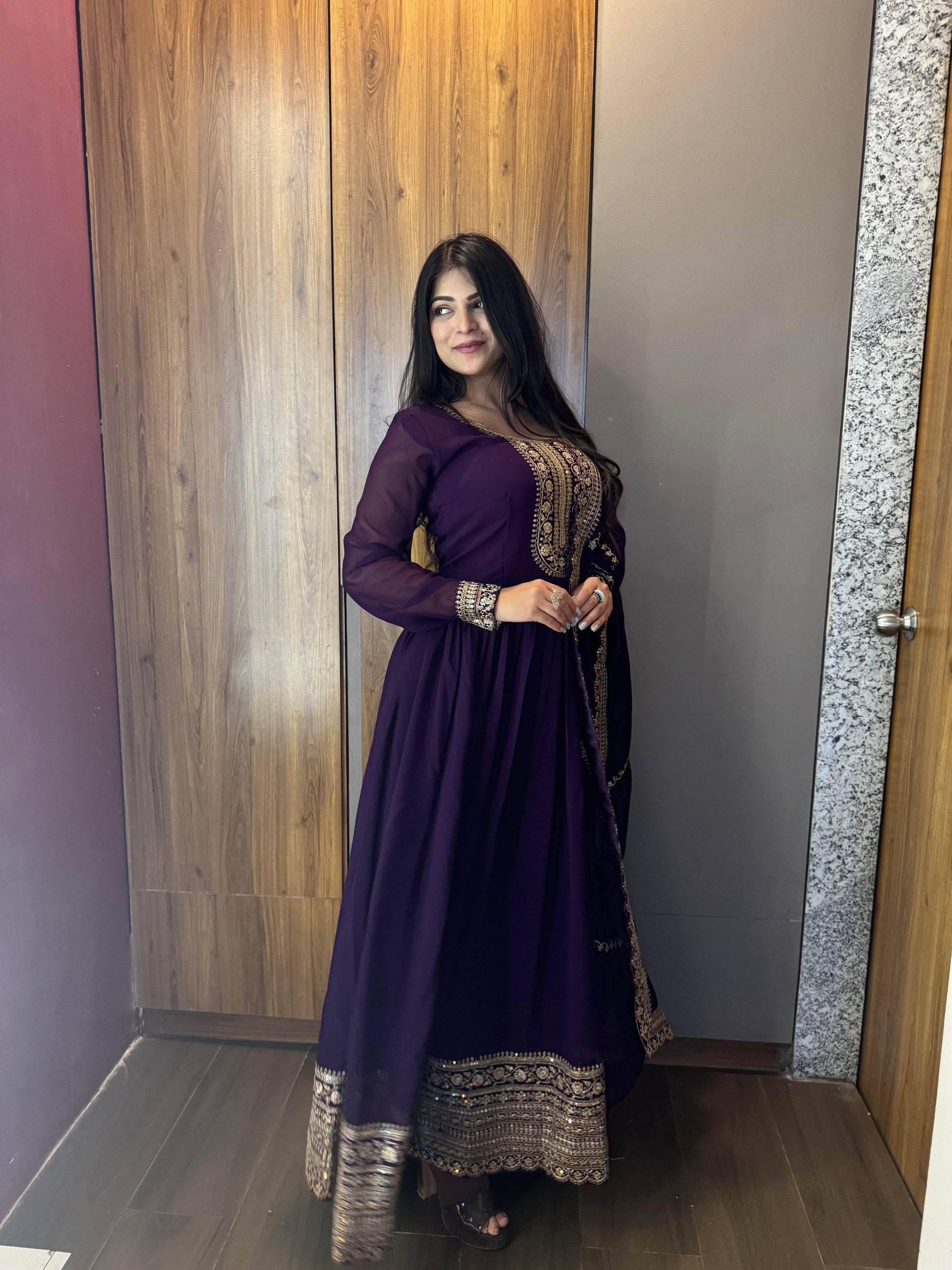 ANCHOR VISHWA PANDYA IN PURPLE COLOR FAUX BLOOMING RICH SEQUENCE EMBROIDERED GOWN