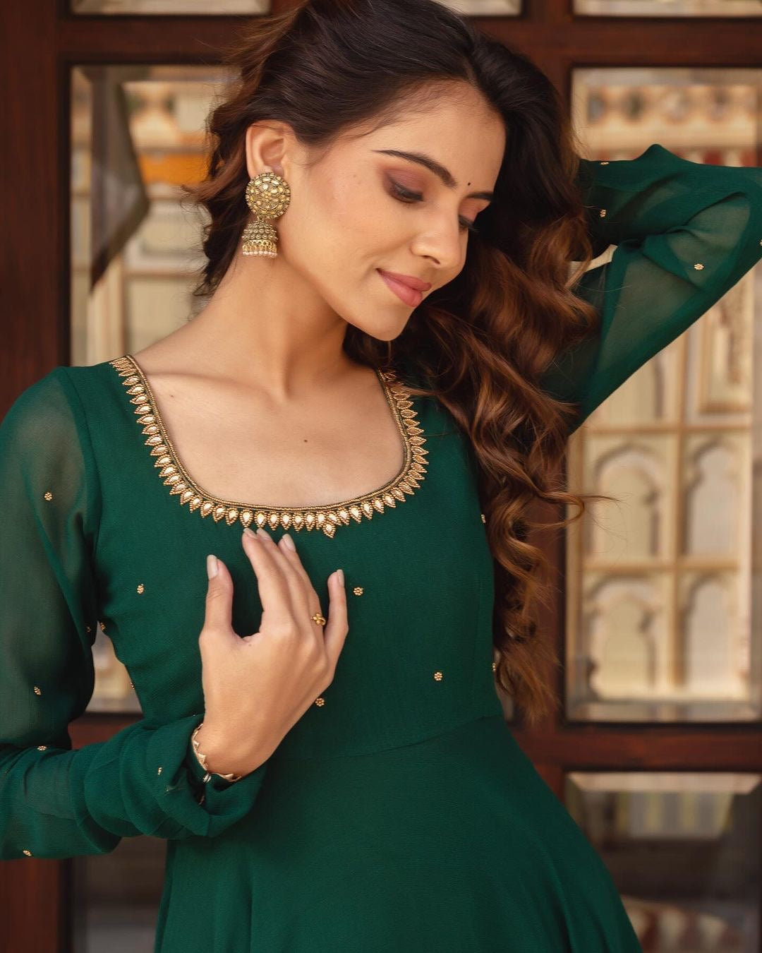 GREEN COLOR SOFT GEORGETTE WITH SEQUENCE FULLY FLAIR ANARKALI SUIT