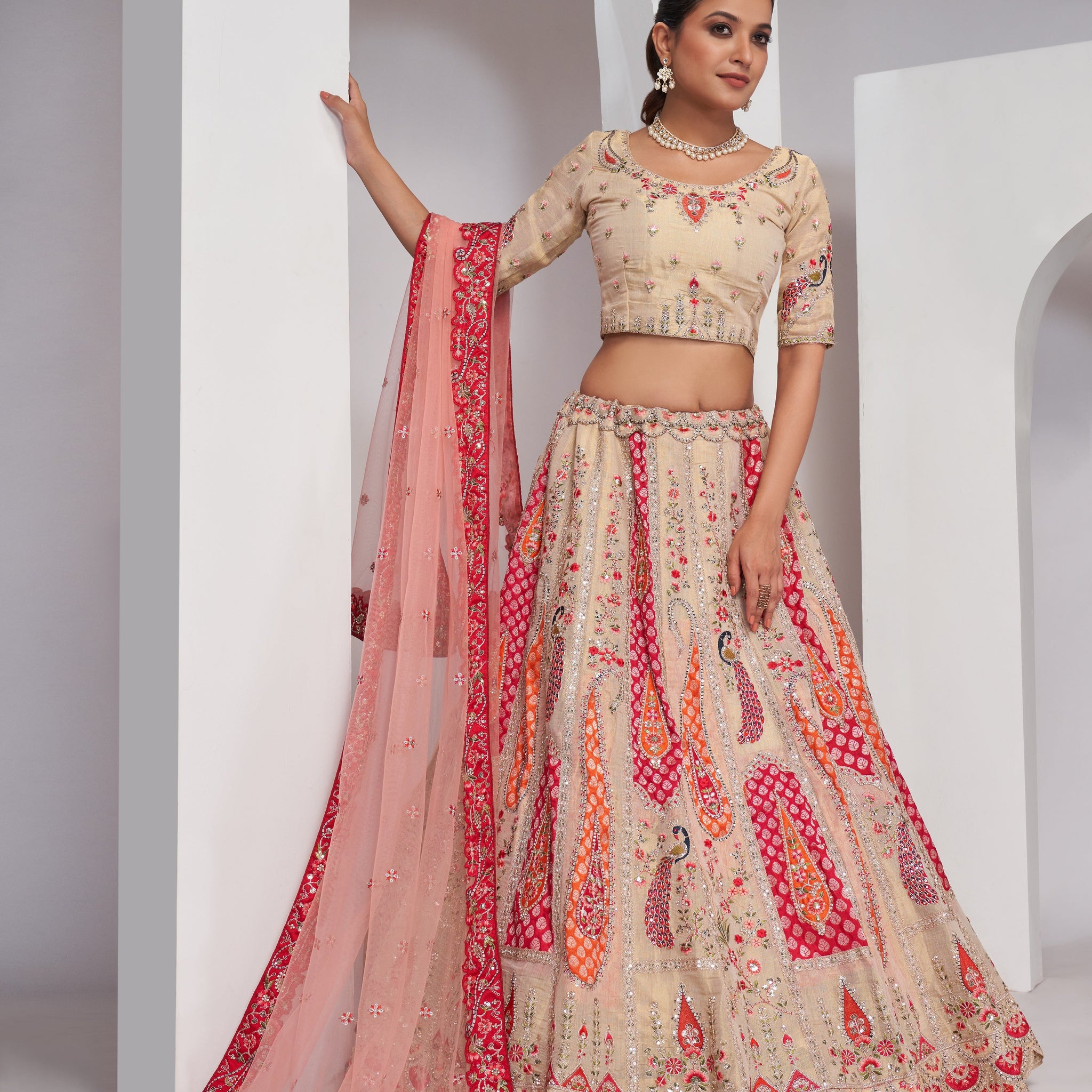 ELEGANT ROSE-PINK SILK LEHENGA CHOLI WITH PEACOCK & PAISLEY MOTIFS