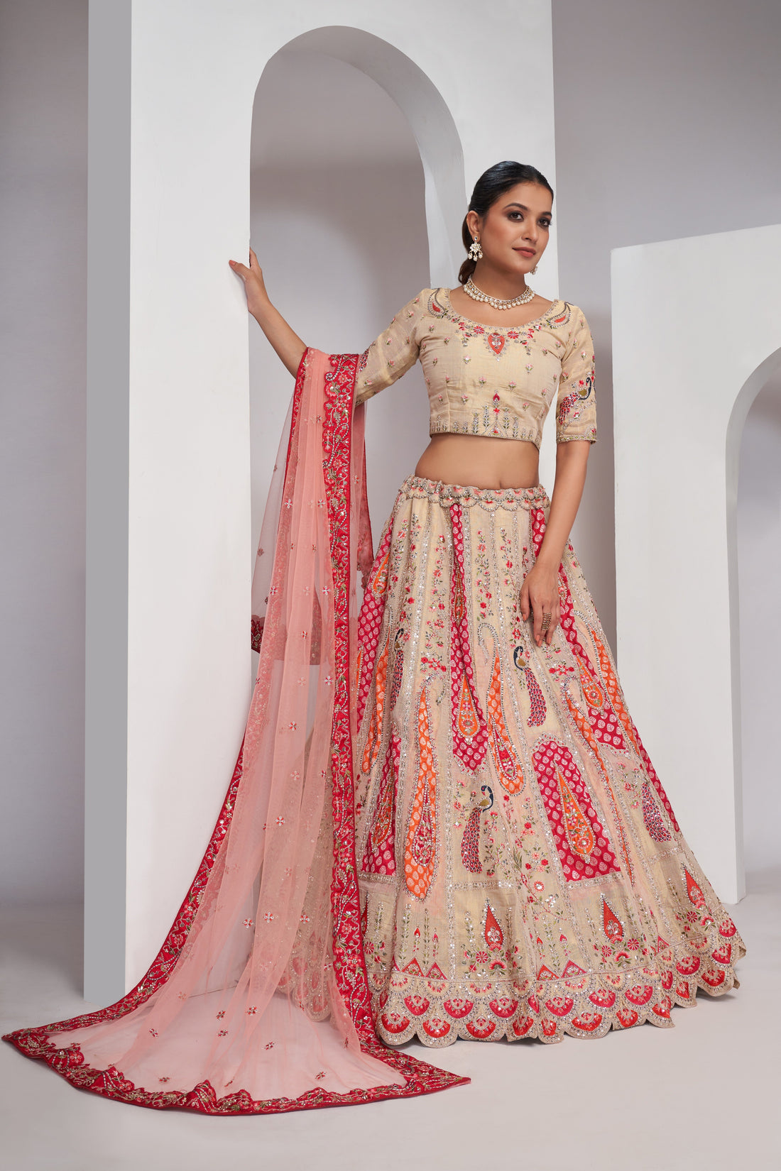 ELEGANT ROSE-PINK SILK LEHENGA CHOLI WITH PEACOCK & PAISLEY MOTIFS
