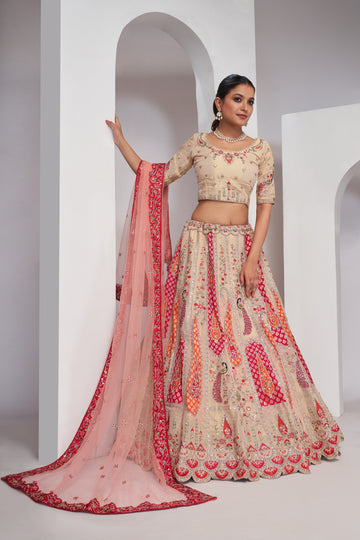 ELEGANT ROSE-PINK SILK LEHENGA CHOLI WITH PEACOCK & PAISLEY MOTIFS