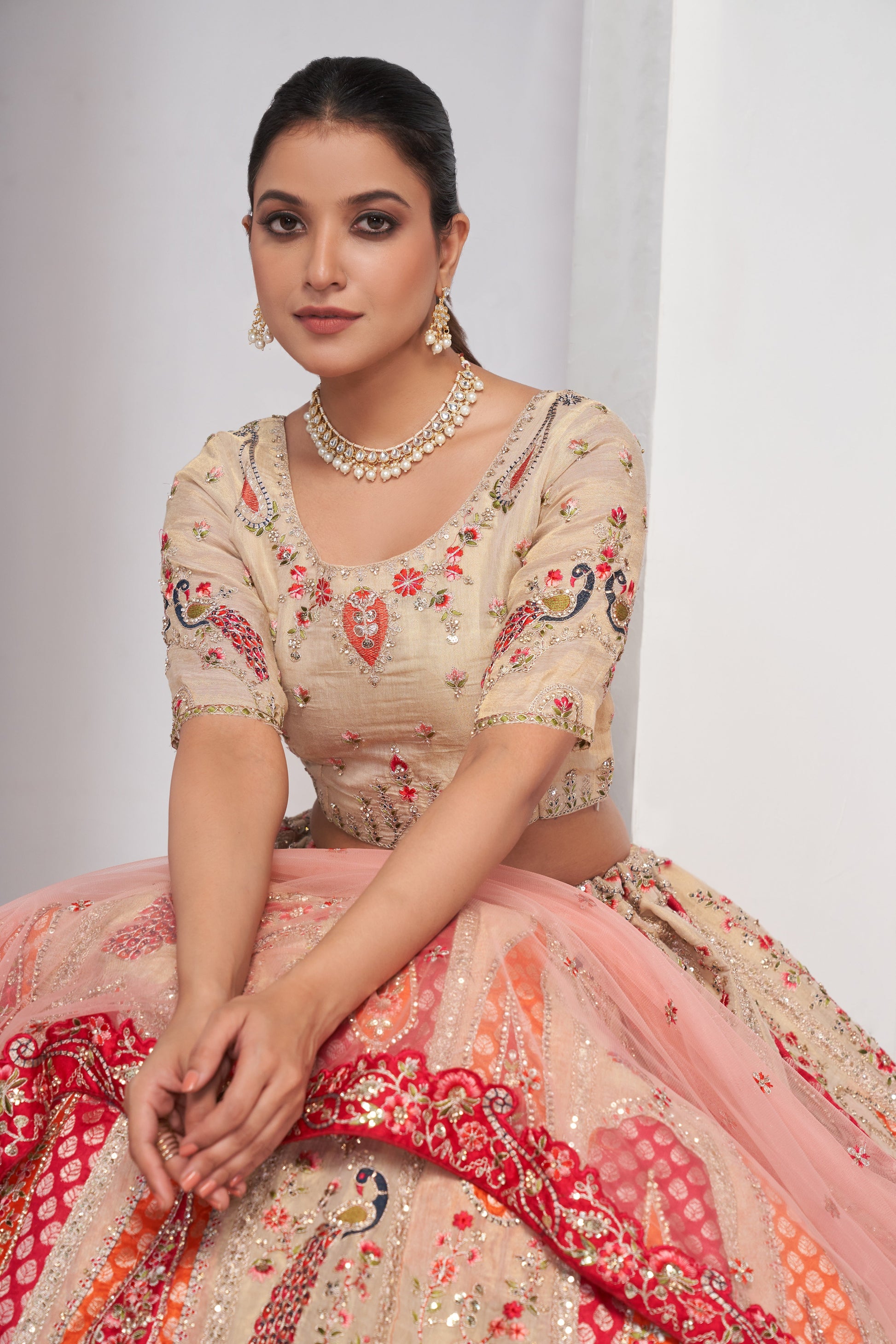 ELEGANT ROSE-PINK SILK LEHENGA CHOLI WITH PEACOCK & PAISLEY MOTIFS