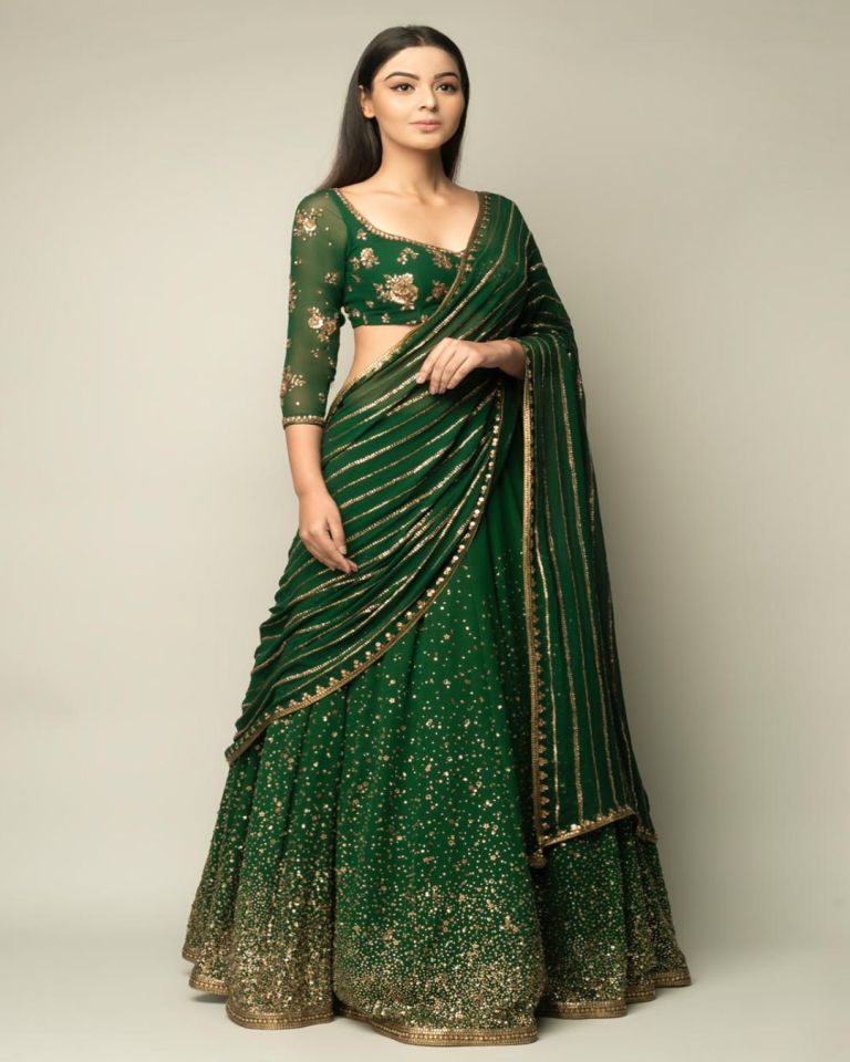 CLASSIC GREEN GEORGETE BASE STONE AND SEQUENCE WORK LEHENGA CHOLI