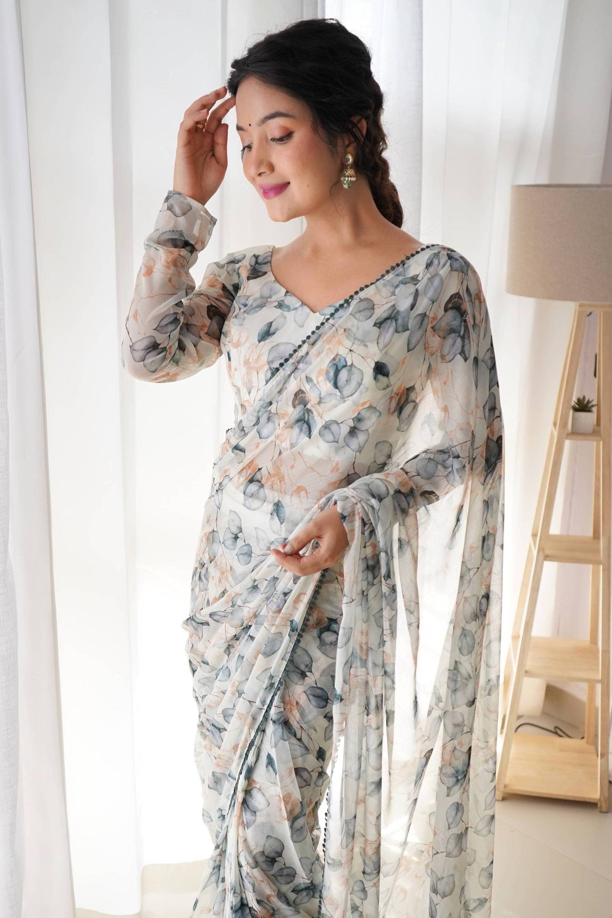 STEP UP YOUR STYLE GAME WITH THIS GORGEOUS CREAM LEAF PRINT CHIFFON SAREE