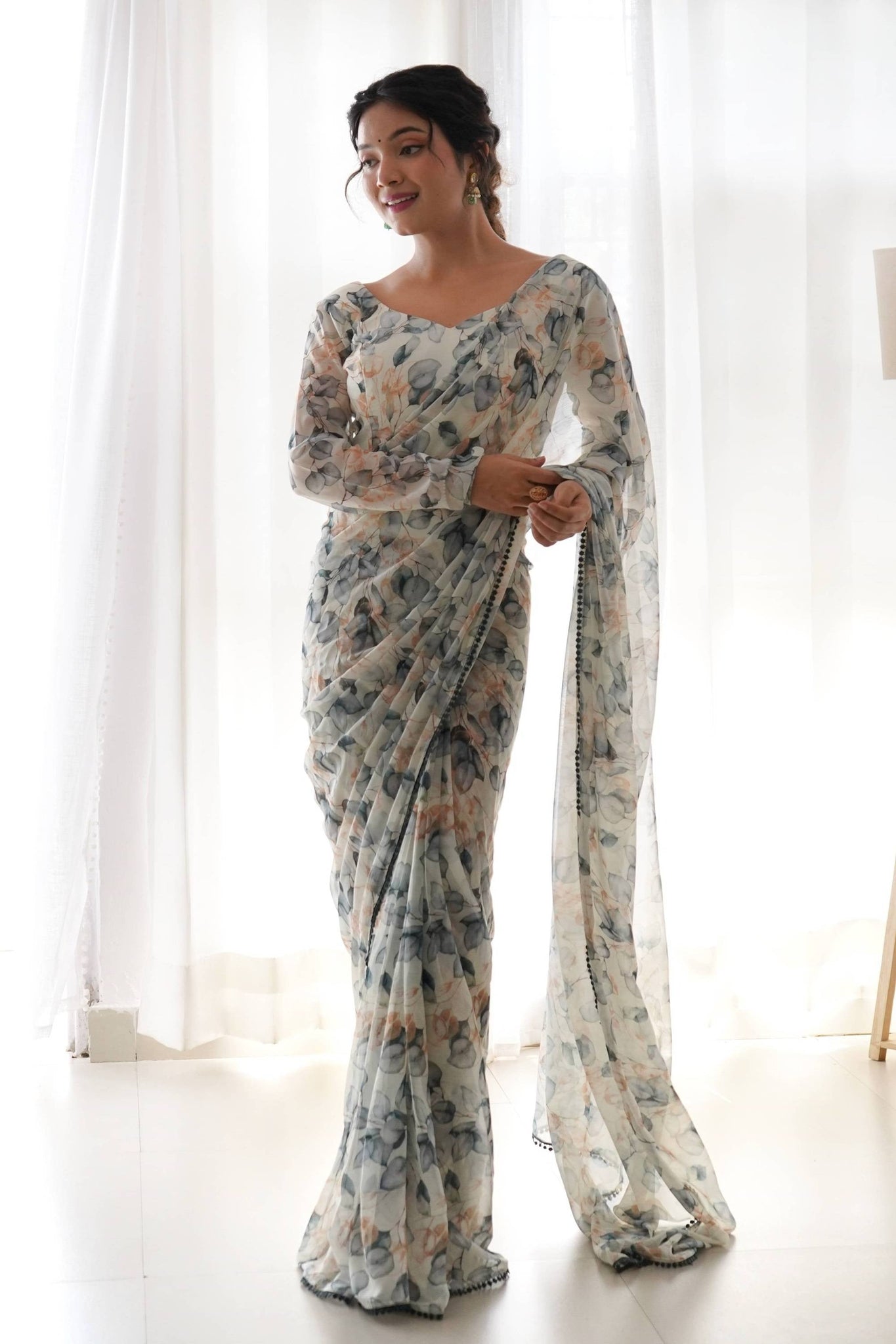 STEP UP YOUR STYLE GAME WITH THIS GORGEOUS CREAM LEAF PRINT CHIFFON SAREE
