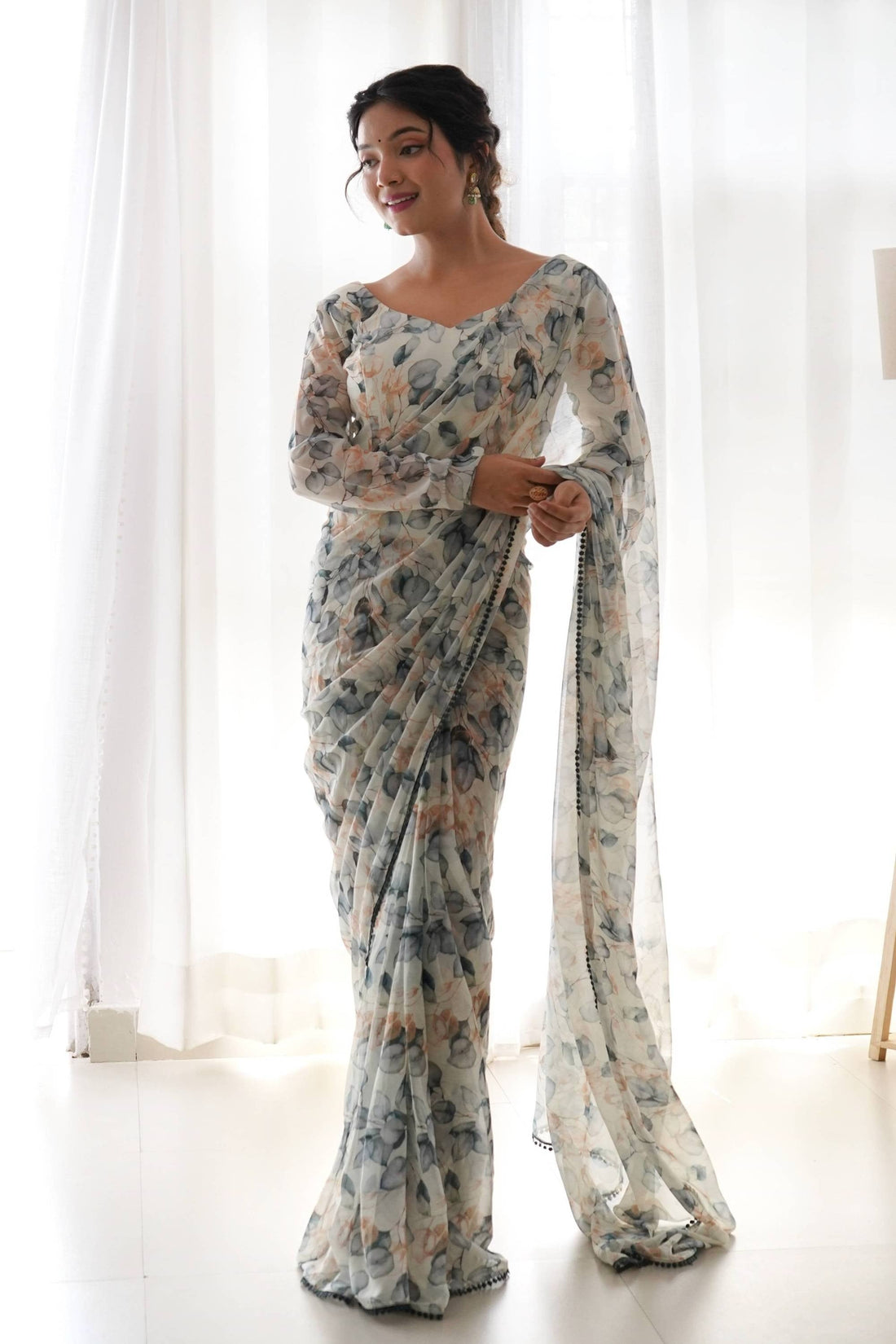 STEP UP YOUR STYLE GAME WITH THIS GORGEOUS CREAM LEAF PRINT CHIFFON SAREE