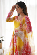 EXPERIENCE THE BEAUTY OF YELLOW ANARKALI WITH PINK FLOWER PRINT