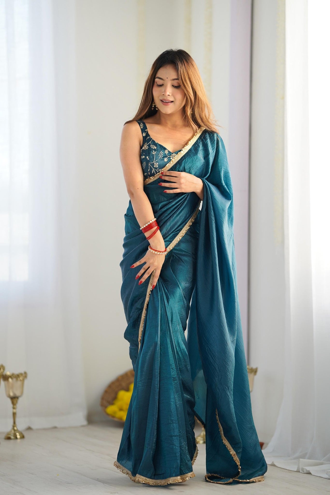 LUXURIOUS TEAL BLUE SAREE IN GOLD CRUSH TISSUE SILK