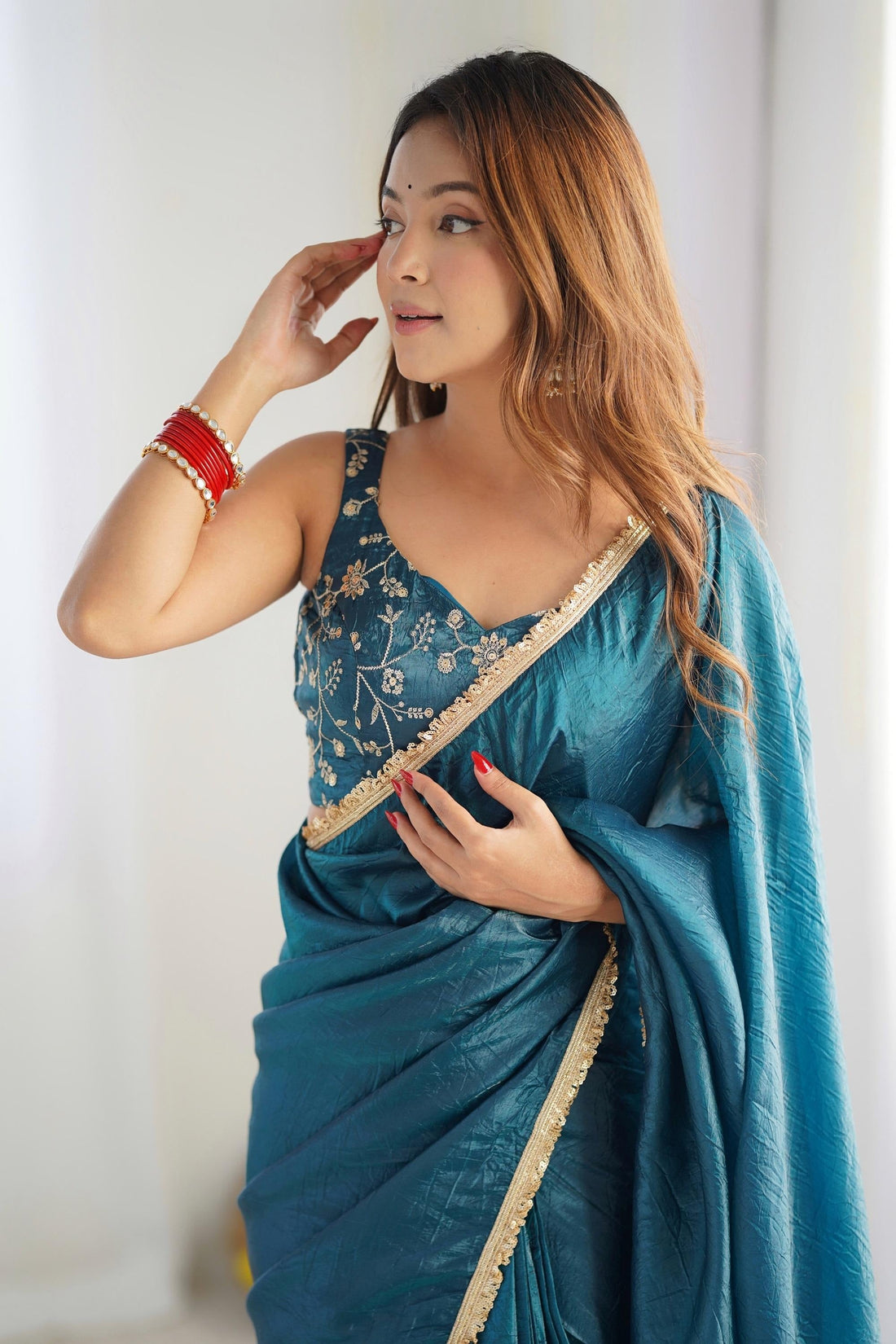 LUXURIOUS TEAL BLUE SAREE IN GOLD CRUSH TISSUE SILK