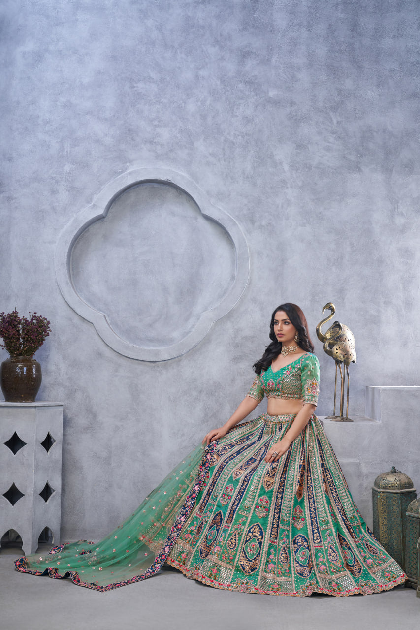 ELEGANT GREEN ORGANZA SILK LEHENGA CHOLI WITH TRADITIONAL PAISLEY MOTIFS & SOFT NET DUPATTA
