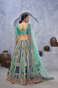 THE BAGH COLLECTION: GRACEFUL GREEN THREAD & SEQUIN EMBELLISHED LEHENGA