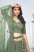 GRACEFUL GREEN BRIDAL LEHENGA WITH AARI EMBROIDERY, FLORAL & PEACOCK MOTIFS