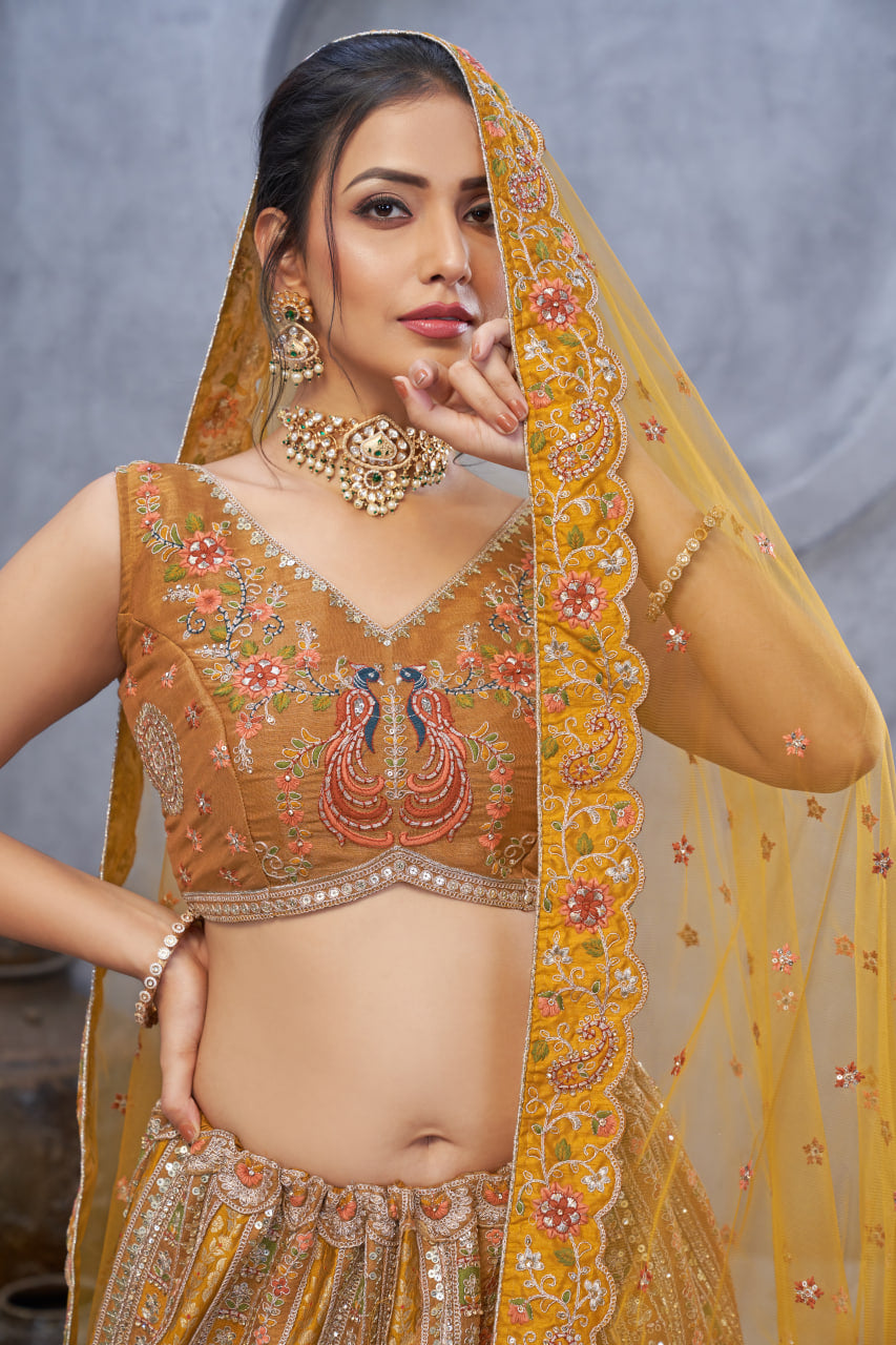 THE BAGH COLLECTION: MARVELOUS MUSTARD PEACOCK EMBROIDERED BRIDAL LEHENGA