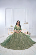 GRACEFUL GREEN BRIDAL LEHENGA WITH AARI EMBROIDERY, FLORAL & PEACOCK MOTIFS