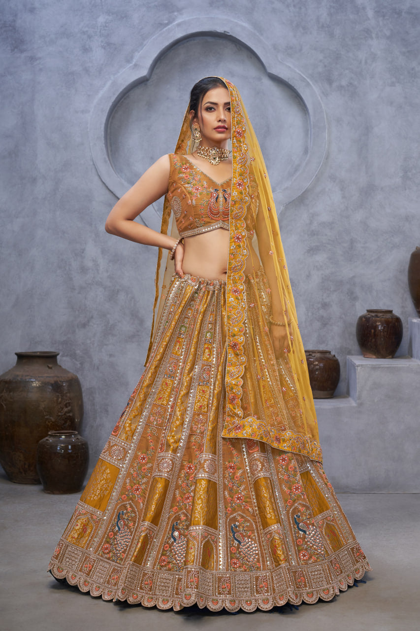 THE BAGH COLLECTION: MARVELOUS MUSTARD PEACOCK EMBROIDERED BRIDAL LEHENGA