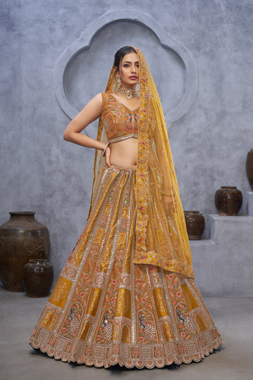 THE BAGH COLLECTION: MARVELOUS MUSTARD PEACOCK EMBROIDERED BRIDAL LEHENGA