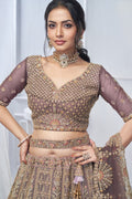 ROYAL GRANDEUR BRIDAL PURPLE SOFT NET LEHENGA WITH PAISLEY & PEACOCK MOTIFS AND HEAVY EMBROIDERY