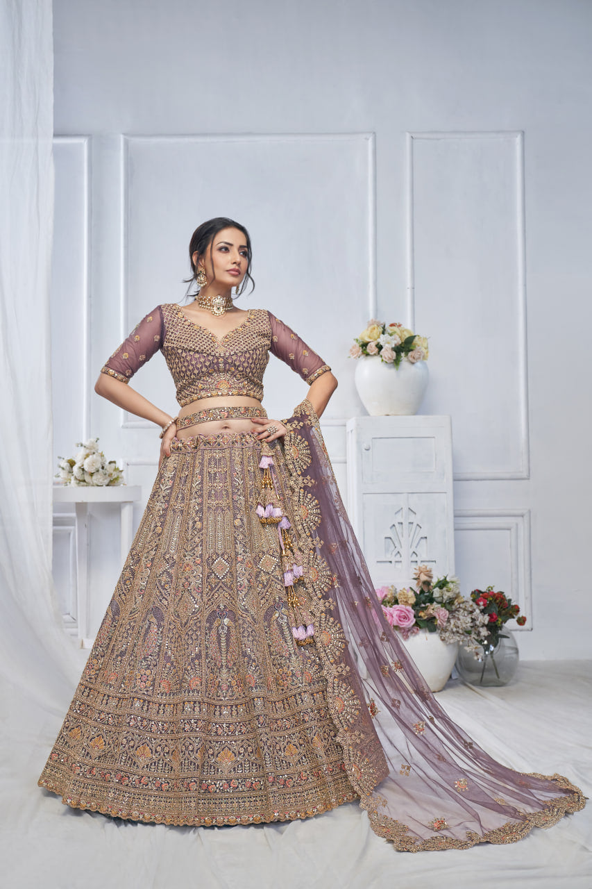 ROYAL GRANDEUR BRIDAL PURPLE SOFT NET LEHENGA WITH PAISLEY & PEACOCK MOTIFS AND HEAVY EMBROIDERY
