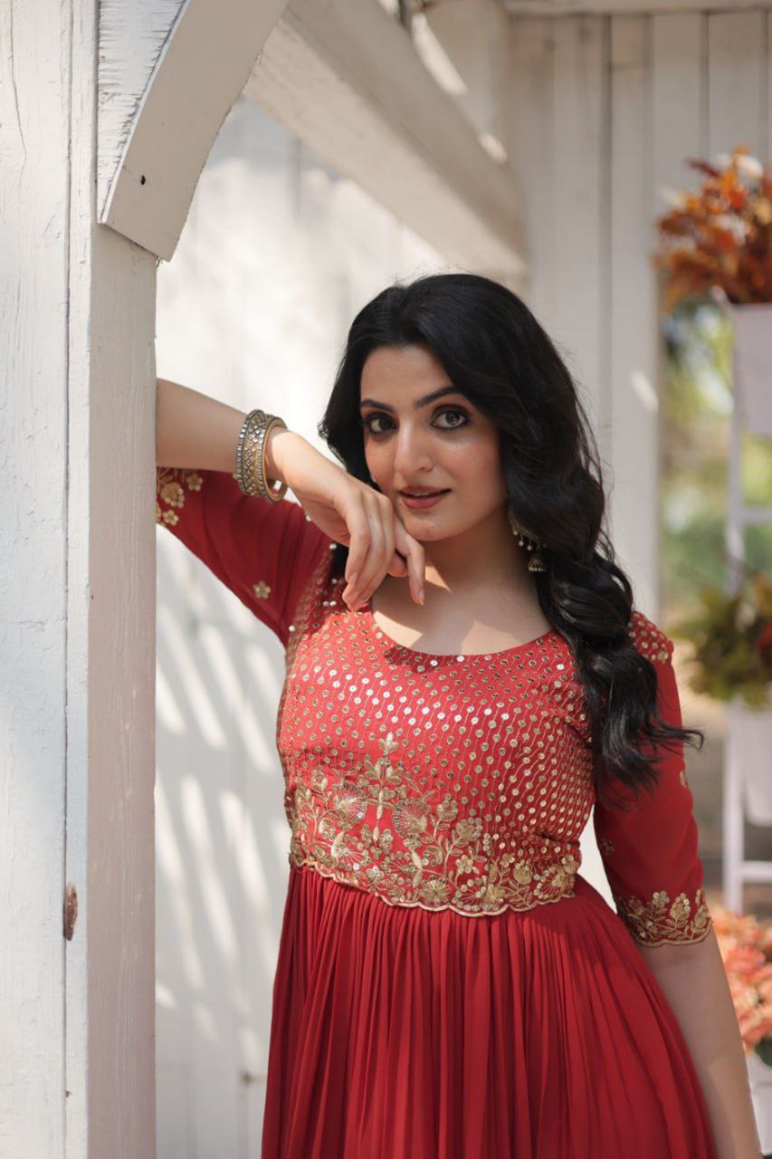 ALLURING ORANGE DRESS EYE-CATCHING ZARI & SEQUIN WORK