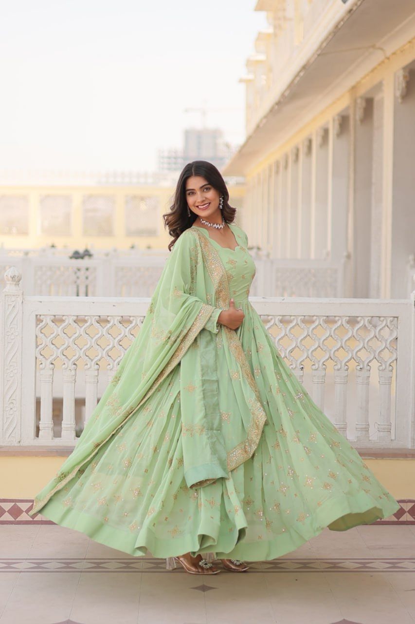 PISTA COLOR HEAVY WEDDING WEAR GOWN WITH DUPATTA