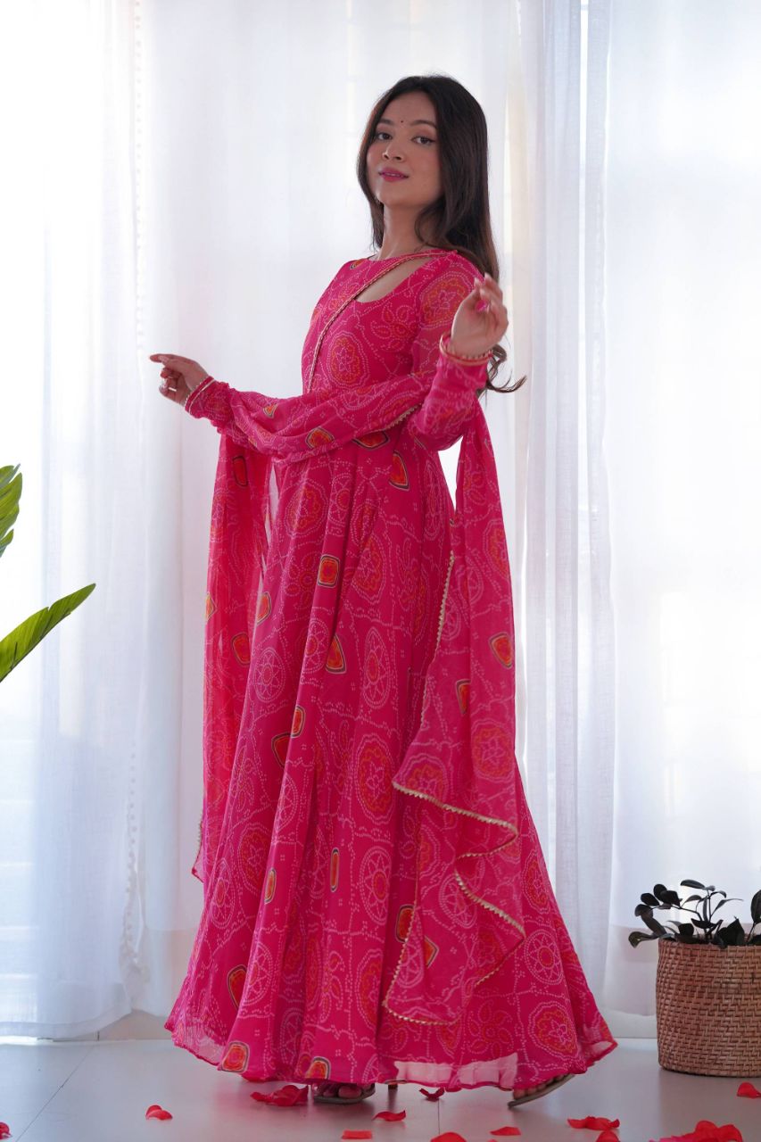 STEP INTO ELEGANCE WITH OUR PINK BANDHEJ PRINT CHIFFON GOWN WITH DUPATTA